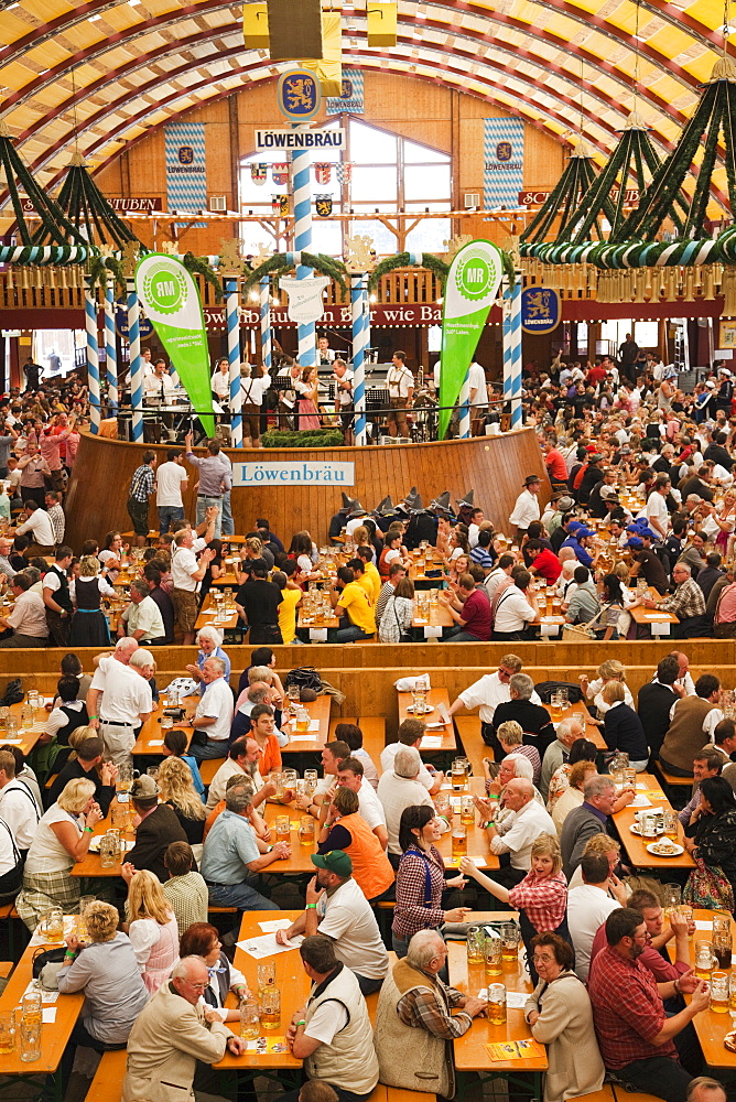 Typical beer tent scene, Oktoberfest, Munich, Bavaria, Germany, Europe