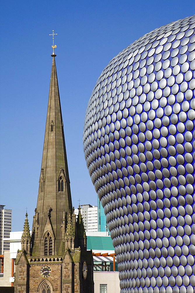 Selfridges Department Store designed by Future Systems and St. Martins Church spire, Bullring Shopping Mall, Birmingham, England, United Kingdom, Europe