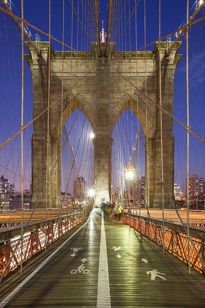 Dusk on the Brooklyn Bridge in New York, New York State, United States of America, North America