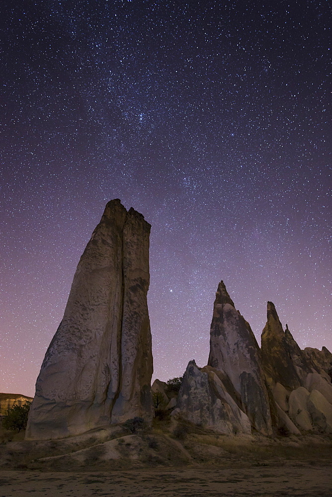 Night time in the Rose Valley showing the unusual rock formations and desert landscape light painted, Cappadocia, Anatolia, Turkey, Asia Minor, Eurasia