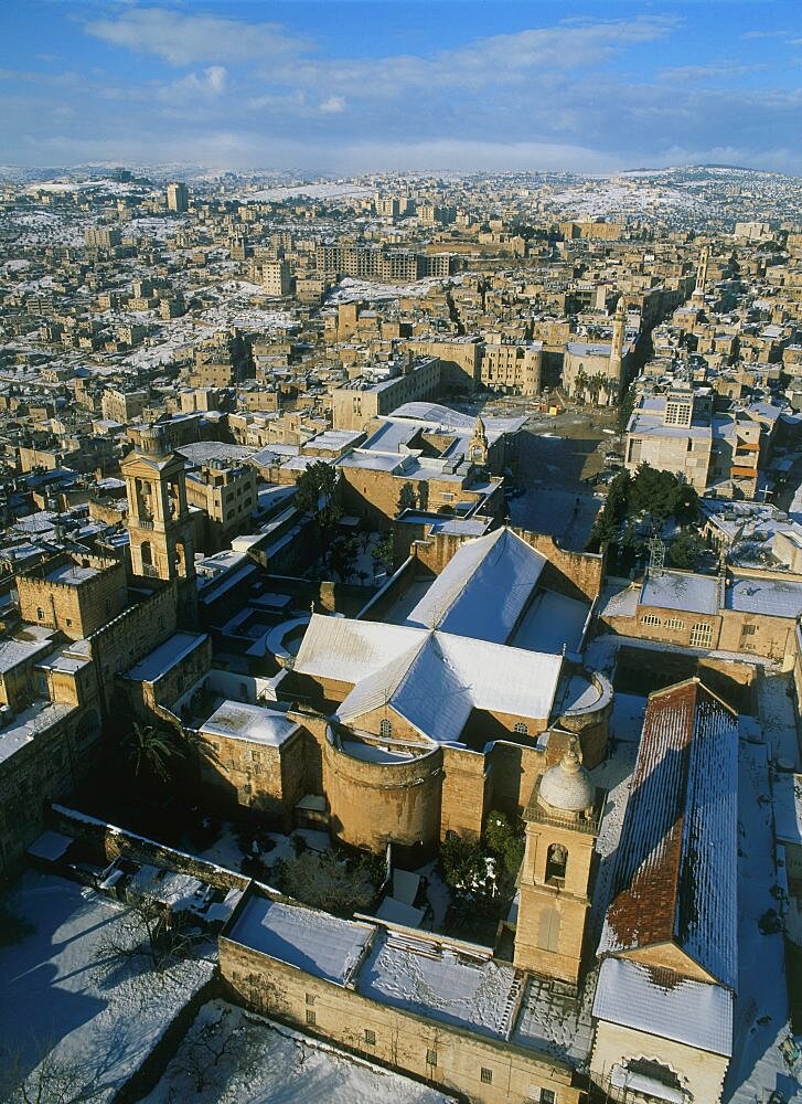 Aerial church of nativity in the modern town of Bethlehem after snow fall, Israel