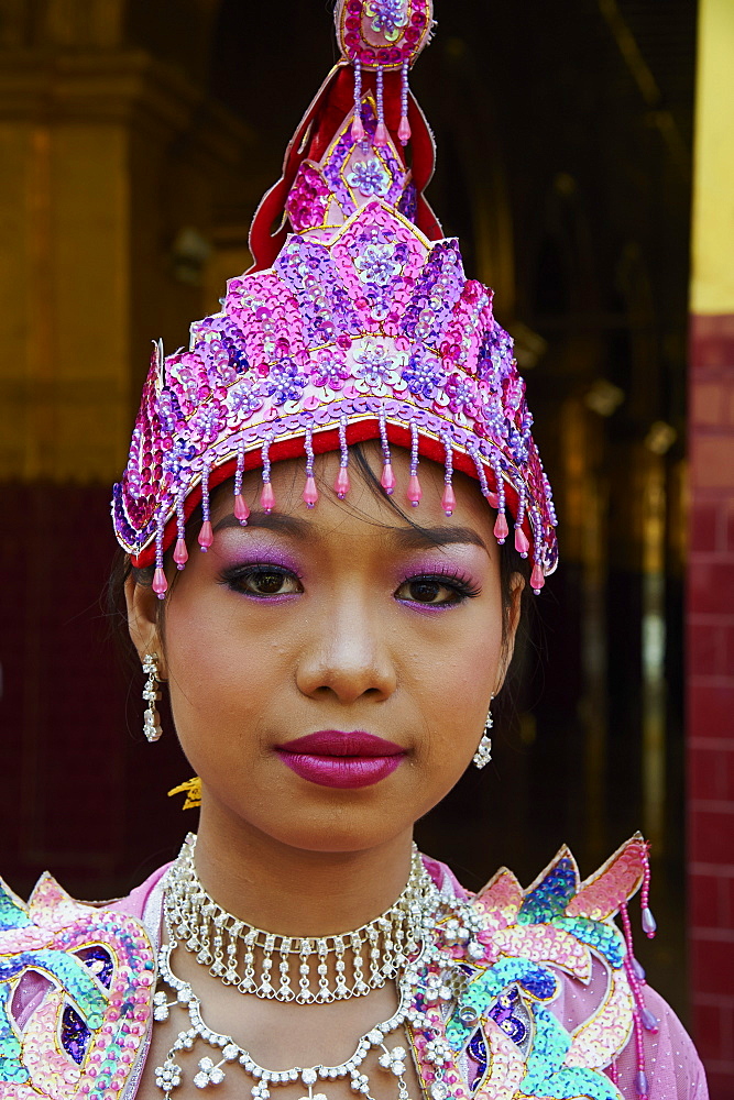 Young Burmese girl during ritual for becoming a nun, Paya Mahamuni, Mandalay, Myanmar (Burma), Asia