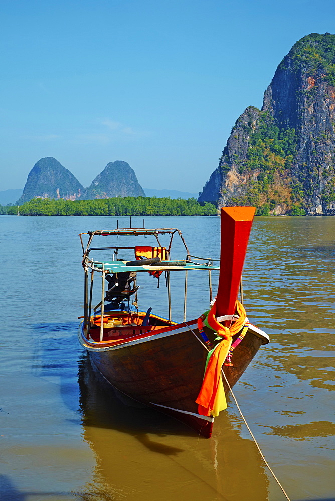 Phang Nga Bay, Ao Phang Nga Bay National Park, Krabi Province, Thailand, Southeast Asia, Asiaslight shadow adjustment at fron of boat, boosted overall saturation