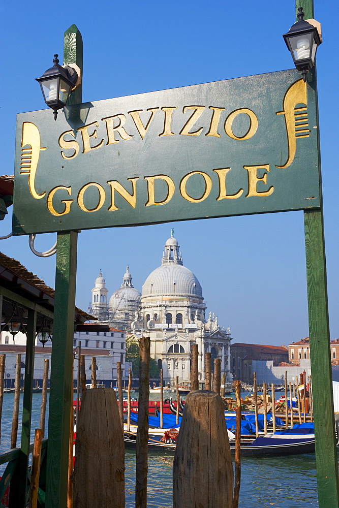 Gondola sign and the Church of Santa Maria della Salute, Venice, UNESCO World Heritage Site, Veneto, Italy, Europe