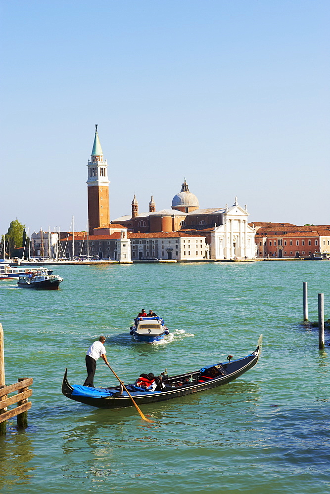 Gondolas and the island of San Giorgio Maggiore, Venice, UNESCO World Heritage Site, Veneto, Italy, Europe