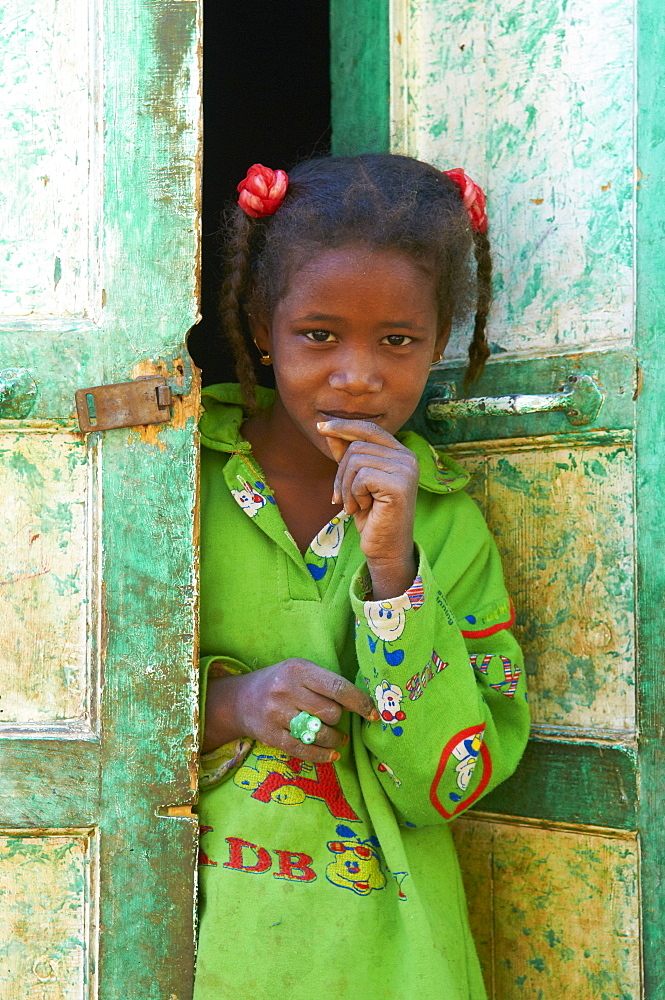 Girl in Nubian painted village near Aswan, Egypt, North Africa, Africa