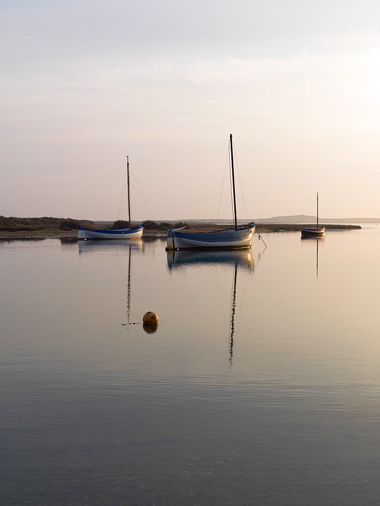 Boats in the harbour at Burnham Overy Staithe, Norfolk, England, United Kingdom, Europe