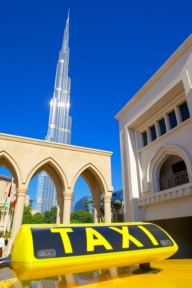 Burj Khalifa and taxi, Dubai, United Arab Emirates, Middle East