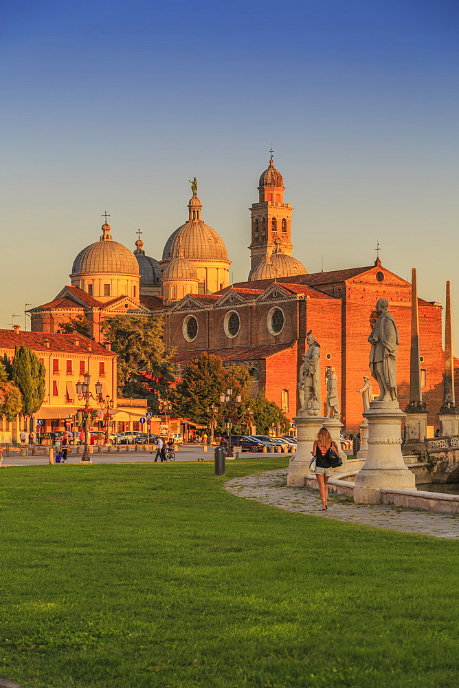 View of Santa Giustina Basilica visible from Prato della Valle during golden hour, Padua, Veneto, Italy, Europe