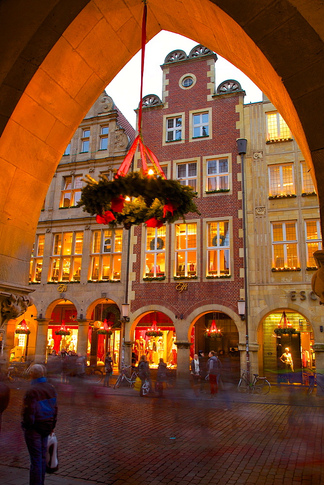 View through arches on Prinzipalmarkt, Munster, North Rhine-Westphalia, Germany, Europe