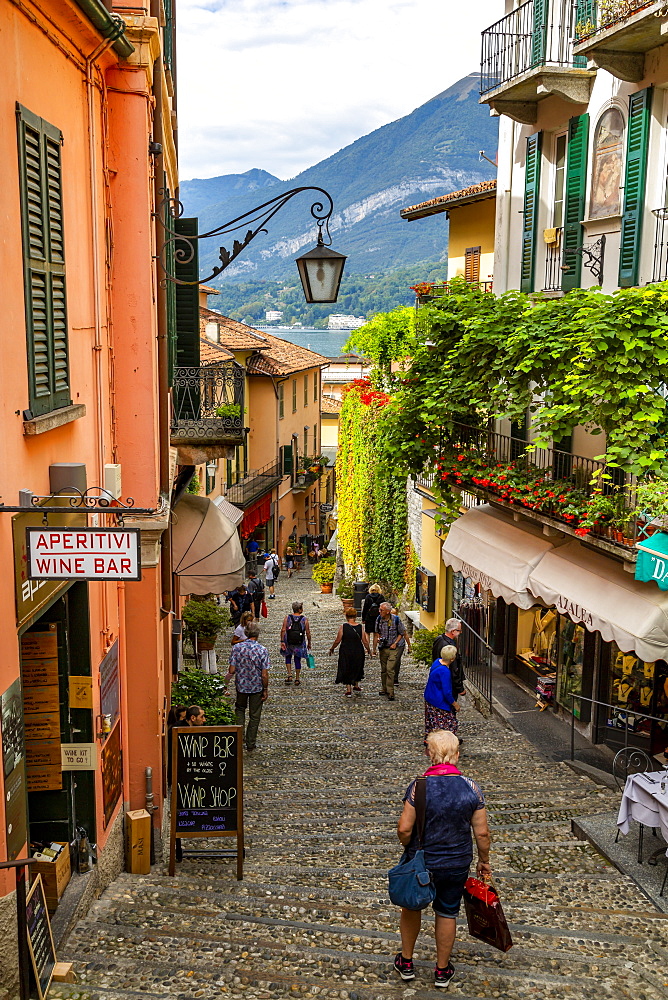 View of shops on cobbled street in Bellagio, Province of Como, Lake Como, Lombardy, Italian Lakes, Italy, Europe