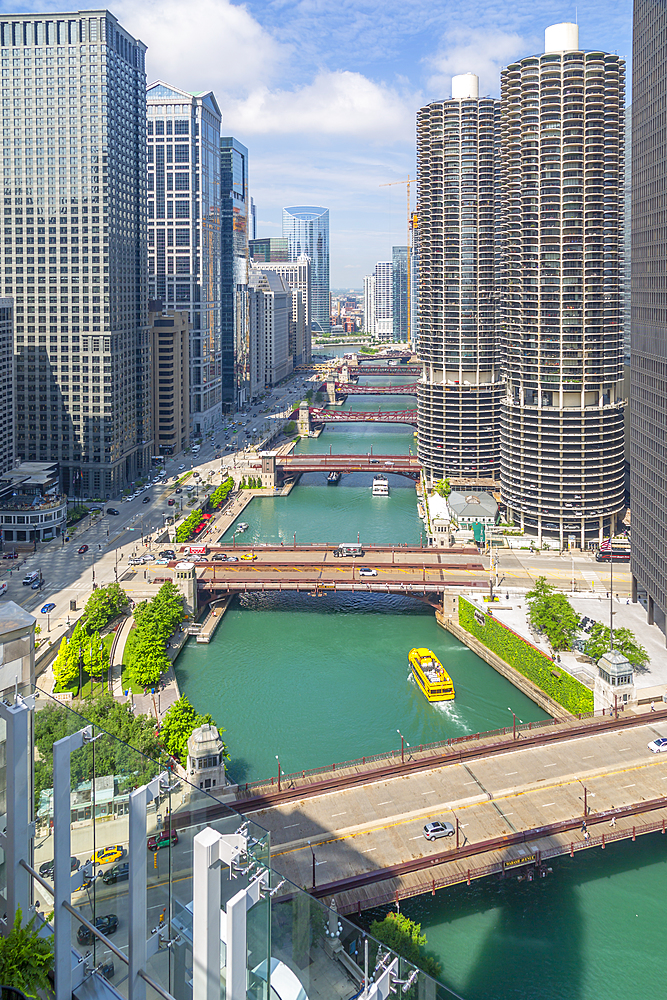 View of Water Taxi on Chicago River from rooftop terrace, Downtown Chicago, Illinois, United States of America, North America