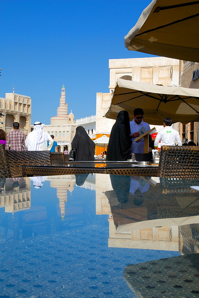 The restored Souq Waqif and spiral Mosque of the Kassem Darwish Fakhroo Islamic Centre, Qatar, Middle East