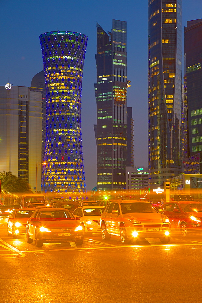 Contemporary architecture and traffic at dusk in the City Centre, Doha, Qatar, Middle East