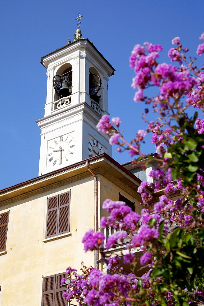 Church clocktower and flowers, Cadenabbia, Lake Como, Lombardy, Italy, Europe