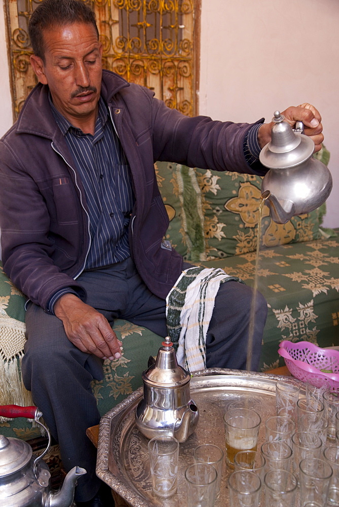 Making mint tea at Mohamed Attai Village in the Atlas Mountains, Morocco, North Africa, Africa