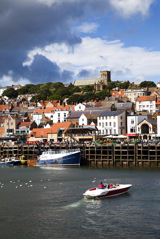 Speedboat entering the Harbour at Scarborough, North Yorkshire, Yorkshire, England, United Kingdom, Europe