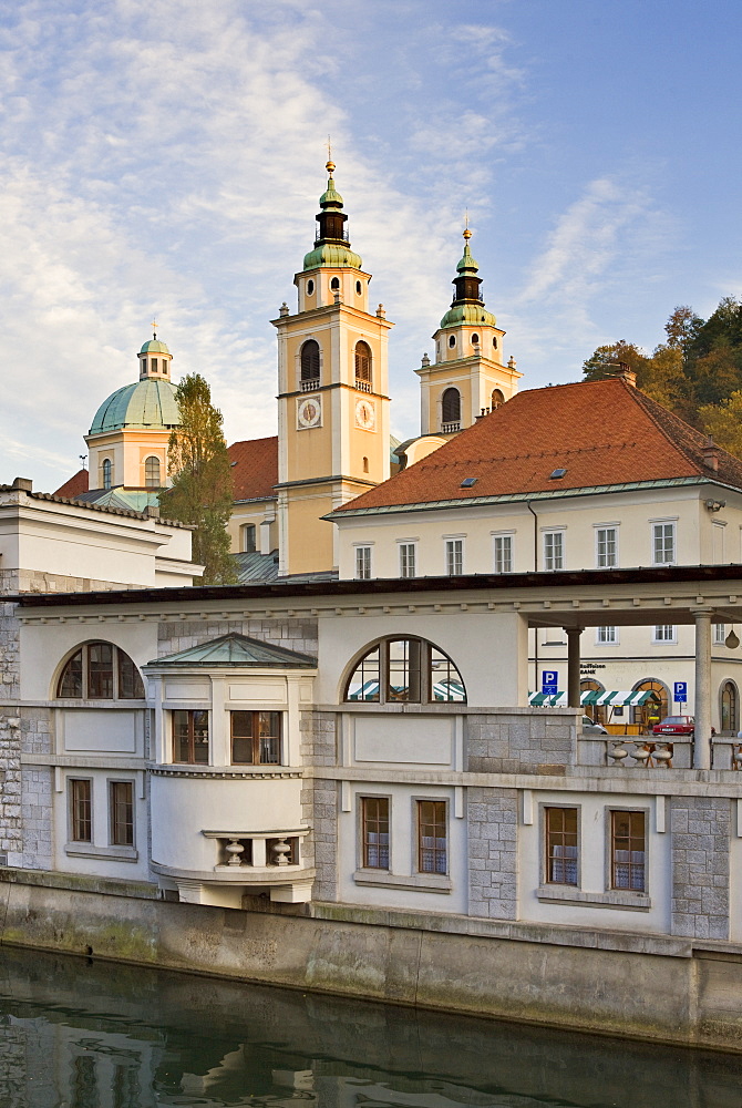 Riverside market halls and the Cathedral of St. Nicholas on the Ljubljanica River, Ljubljana, Slovenia, Europe