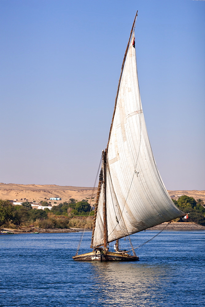 Old felucca laden with rocks on the River Nile near Aswan, Egypt, North Africa, Africa