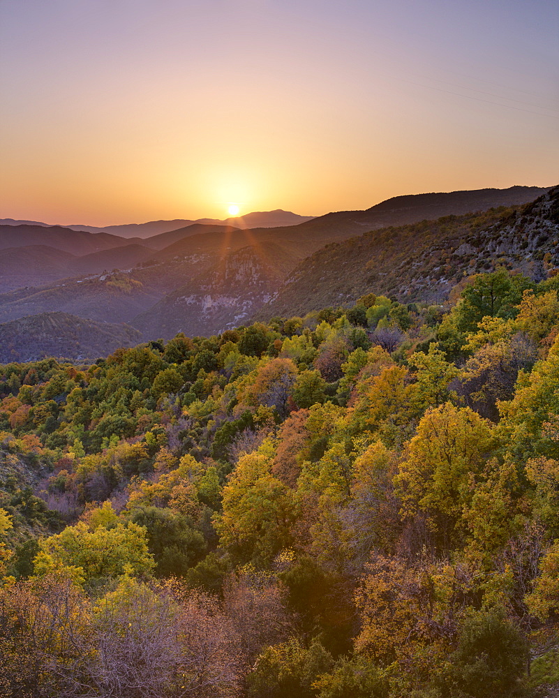 Sunset from Kapesovo, with the Vikos Gorge and the villages of Vitsa and Monodendri beyond, Epirus, Greece, Europe