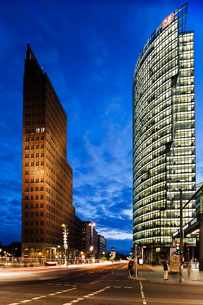 Exterior of Kollhoff Tower and Deutsche Bahn Tower at night, Potsdamer Platz, Berlin, Germany, Europe