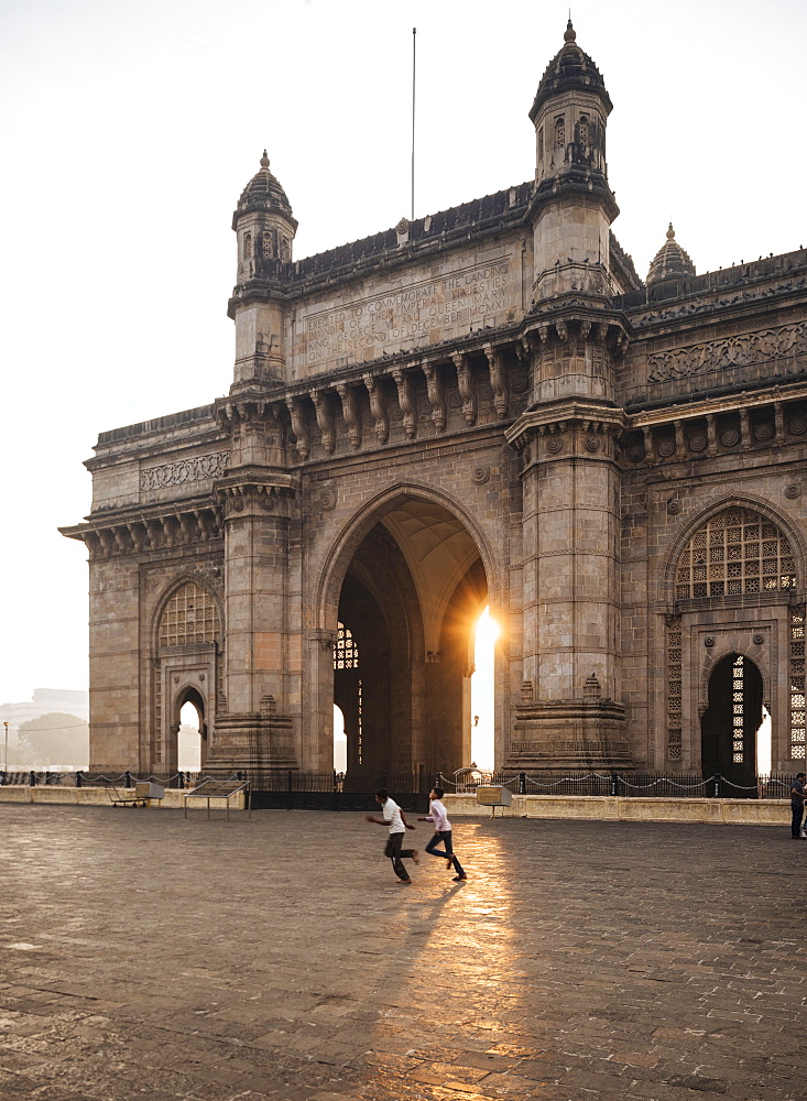 Sunrise behind The Gateway to India, Mumbai (Bombay), India, South Asia