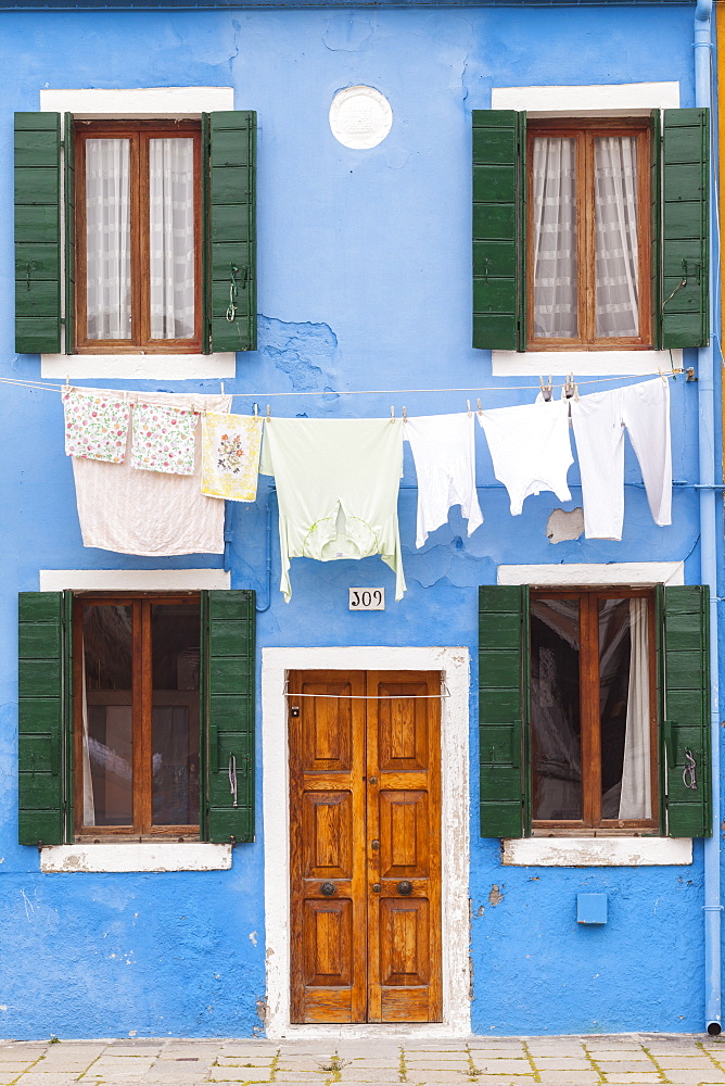 A colorful house on Burano, Venice, Veneto, Italy, Europe