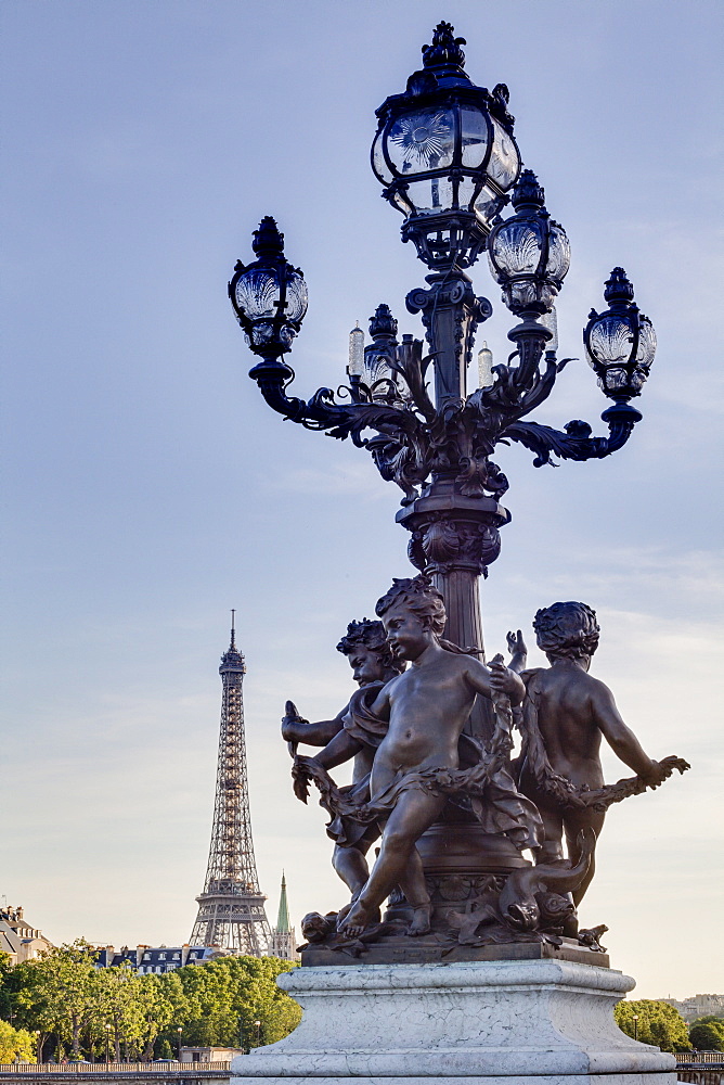 Statues on Pont Alexandre III with the Eiffel Tower in the background, Paris, France, Europe