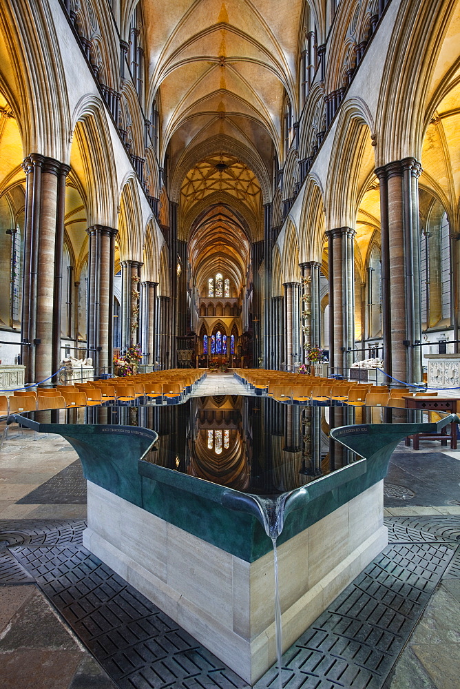 Looking down the nave and across the font in Salisbury Cathedral, Salisbury, Wiltshire, England, United Kingdom, Europe