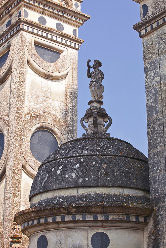 A stone carving of a hunter on one of the domes on the Chateau de Chambord's roof, UNESCO World Heritage Site, Loir-et-Cher, Centre, France, Europe