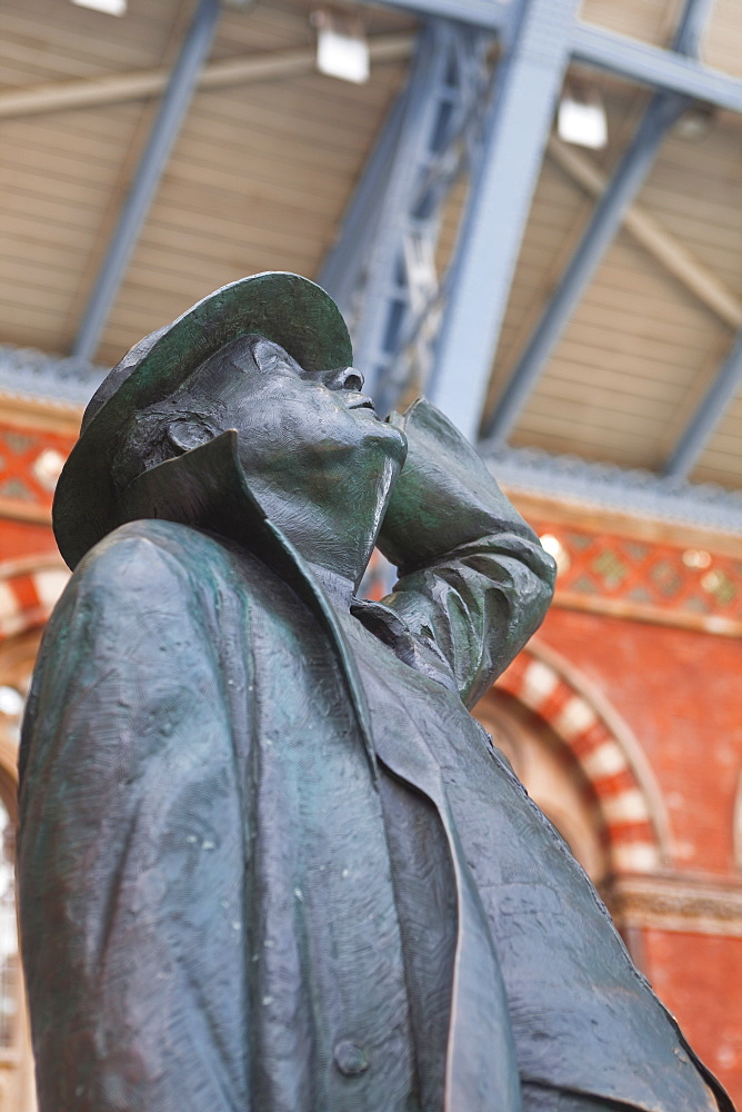 The statue of Sir John Betjeman at St. Pancras International station in London, England, United Kingdom, Europe