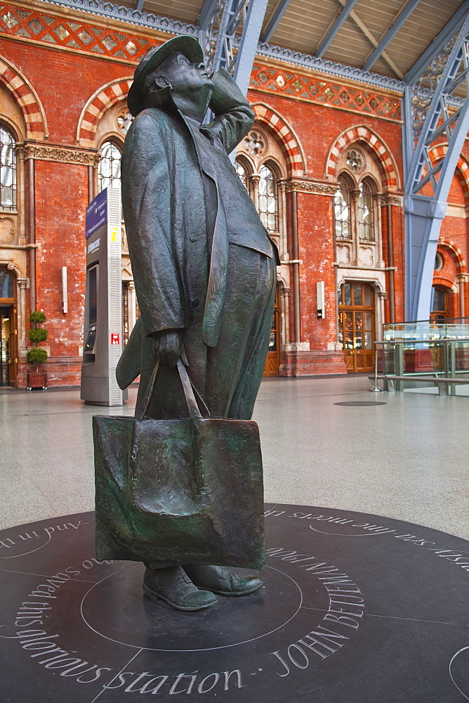 The statue of Sir John Betjeman at St. Pancras International station in London, England, United Kingdom, Europe