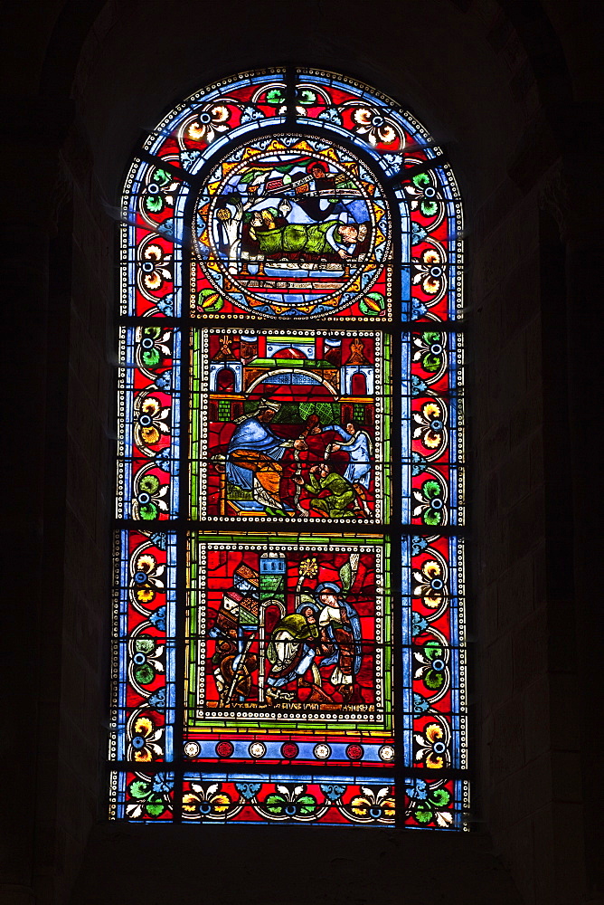 A 12th century stained glass window in the nave of St.-Julien du Mans cathedral, Le Mans, Sarthe, Pays de la Loire, France, Europe 