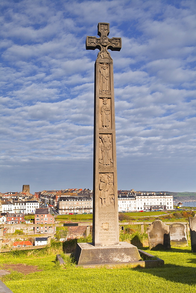 A Celtic style cross in the church yard at Whitby in the North York Moors, Yorkshire, England, United Kingdom, Europe