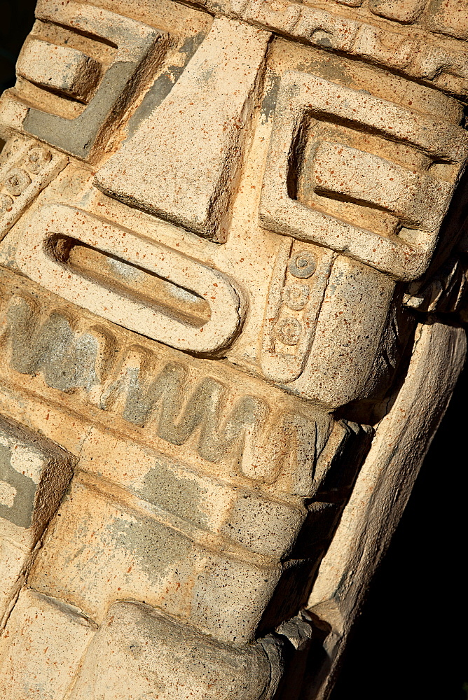 Carved Inca statue on the coast of Lake Titicaca from Copacabana in Bolivia, South America