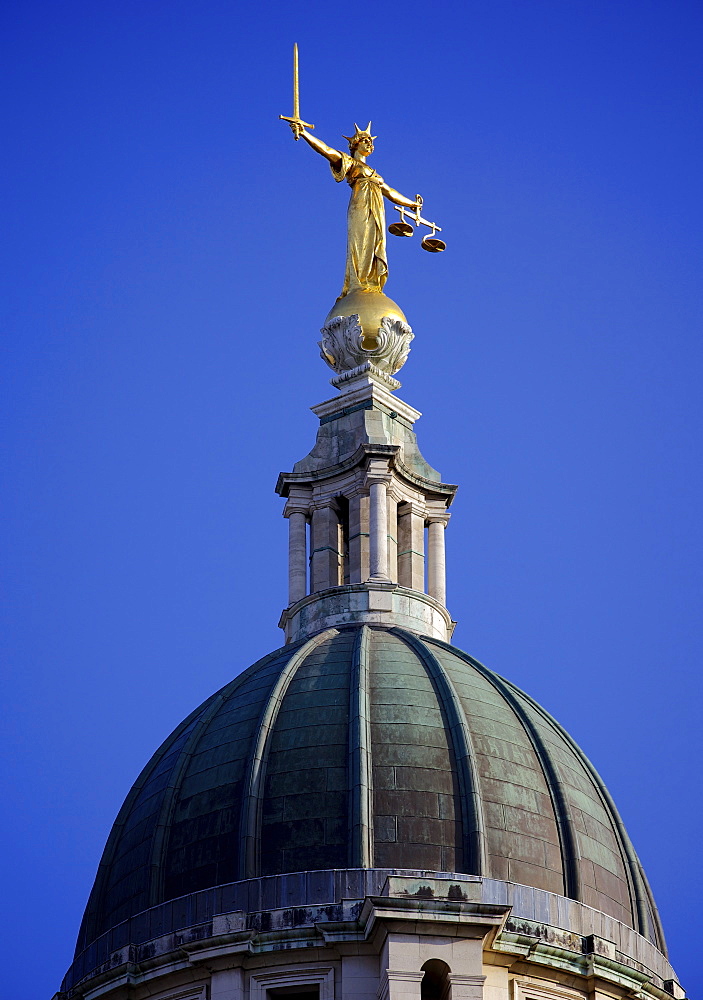 Scales of Justice above the Old Bailey Law Courts (Central Criminal Court) on former site of Newgate Prison, London, England, United Kingdom, Europe 