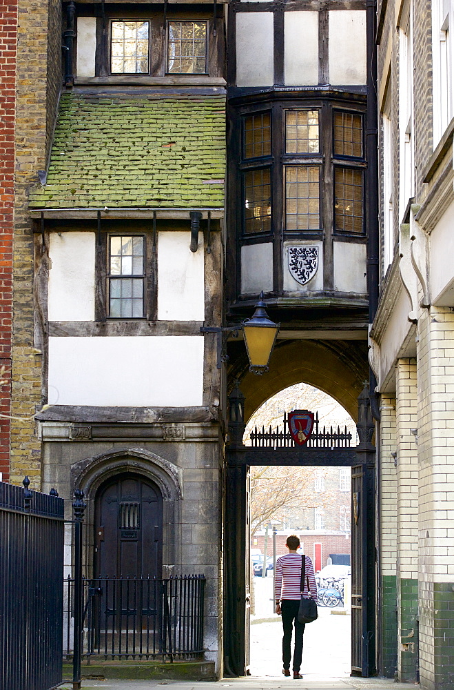 Tudor gateway to St. Bartholomew church, a timbered house from the time of Elizabeth I, West Smithfield, London, England, United Kingdom, Europe 