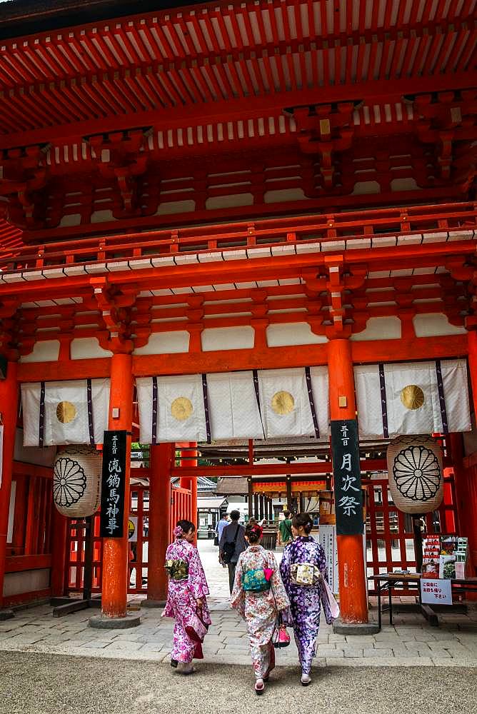 Kimono walk at the entrance to Shimogamo Jinja Temple, Kyoto, Japan