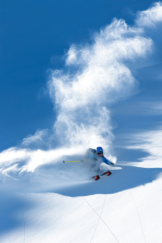 Skier in powder snow, Greenland