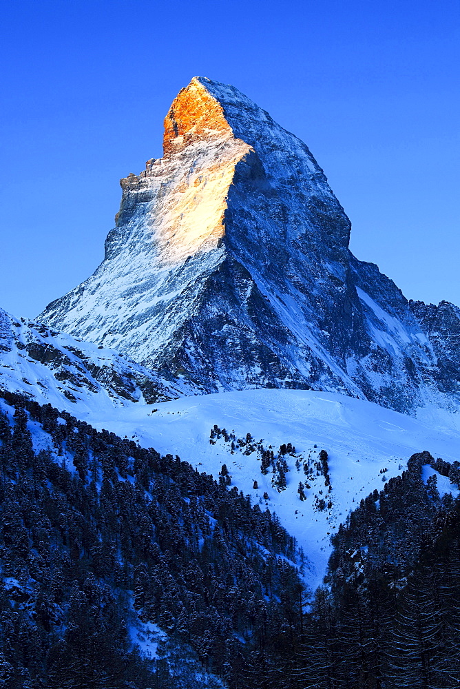 mount Matterhorn 4478 m partly snow covered view from Riederalp morning dusk mood