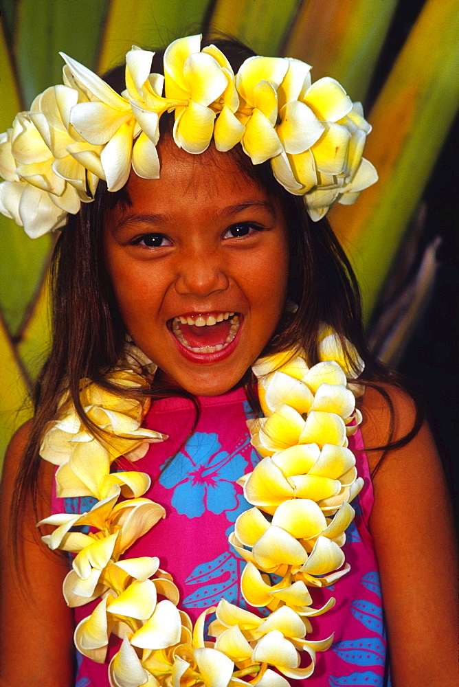 young Hawaiian girl wearing a flower lei Maui Hawaii USA