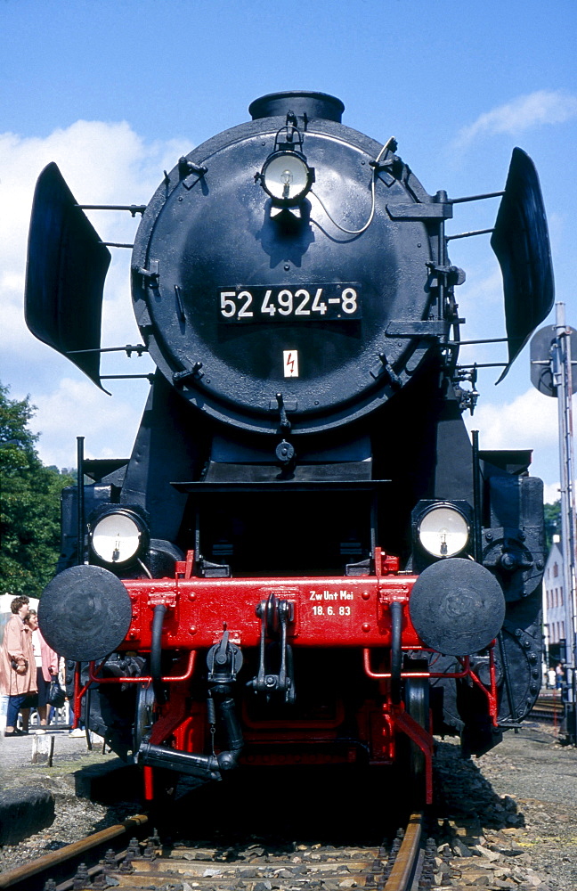 historical steam locomotive typ 52 4924-8 on rails in rail station Annaberg-Buchholz Sachsen Deutschland