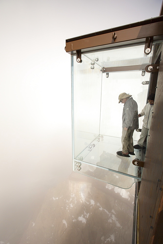 The new glass cage drop experience on the Aiguille Du Midi above Chamonix, France.