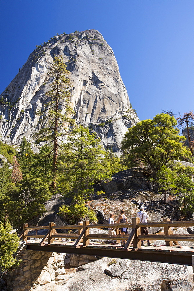 A mountain trail and bridge above the Nevada Fall in the Little Yosemite Valley, Yosemite National Park, California, USA.