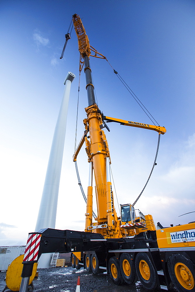 Loch Luichart a 69 MW wind farm being constructed on remote wilderness moorland near Garve in the North West Highlands of Scotland. Its construction will deliver clean, carbon neutral electricity, but does involve massive visual intrusion on wilderness land and tearing up of peat rich moorland to build a network of mountain tracks to access the turbines.