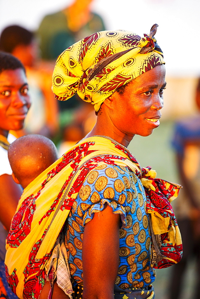 In mid January 2015, a three day period of excessive rain brought unprecedneted floods to the small poor African country of Malawi. It displaced nearly quarter of a million people, devastated 64,000 hectares of alnd, and killed several hundred people. This shot shows a mother and child in Chiteskesa refugee camp, near Mulanje.