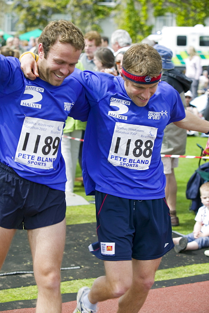 Competitors finishing the Windermere Marathon in the Lake District, Cumbria, England, United Kingdom, Europe