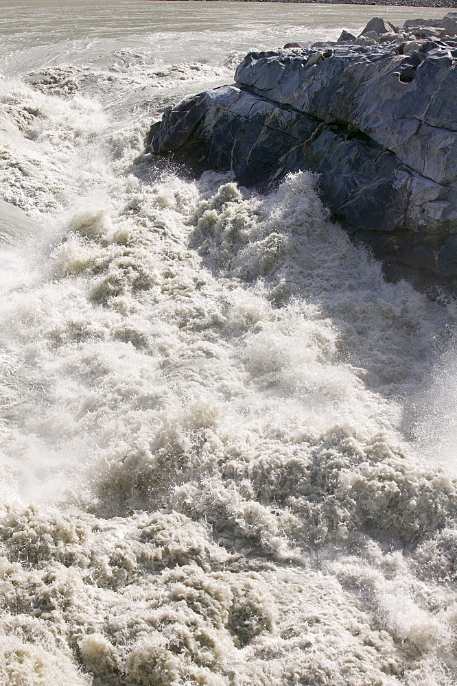 Meltwater from the Russell Glacier that drains the Greenland Ice Sheet 26 km inland from Kangerlussuaq, Greenland, Polar Regions