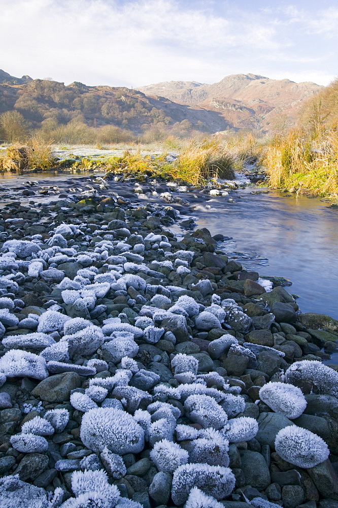 A partially frozen river in Easedale near Grasmere in the Lake District National Park, Cumbria, England, United Kingdom, Europe