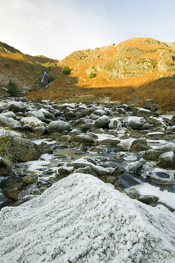 A partially frozen river in Easedale near Grasmere in the Lake District National Park, Cumbria, England, United Kingdom, Europe